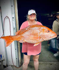 Lady Holding a Giant Red Snapper
